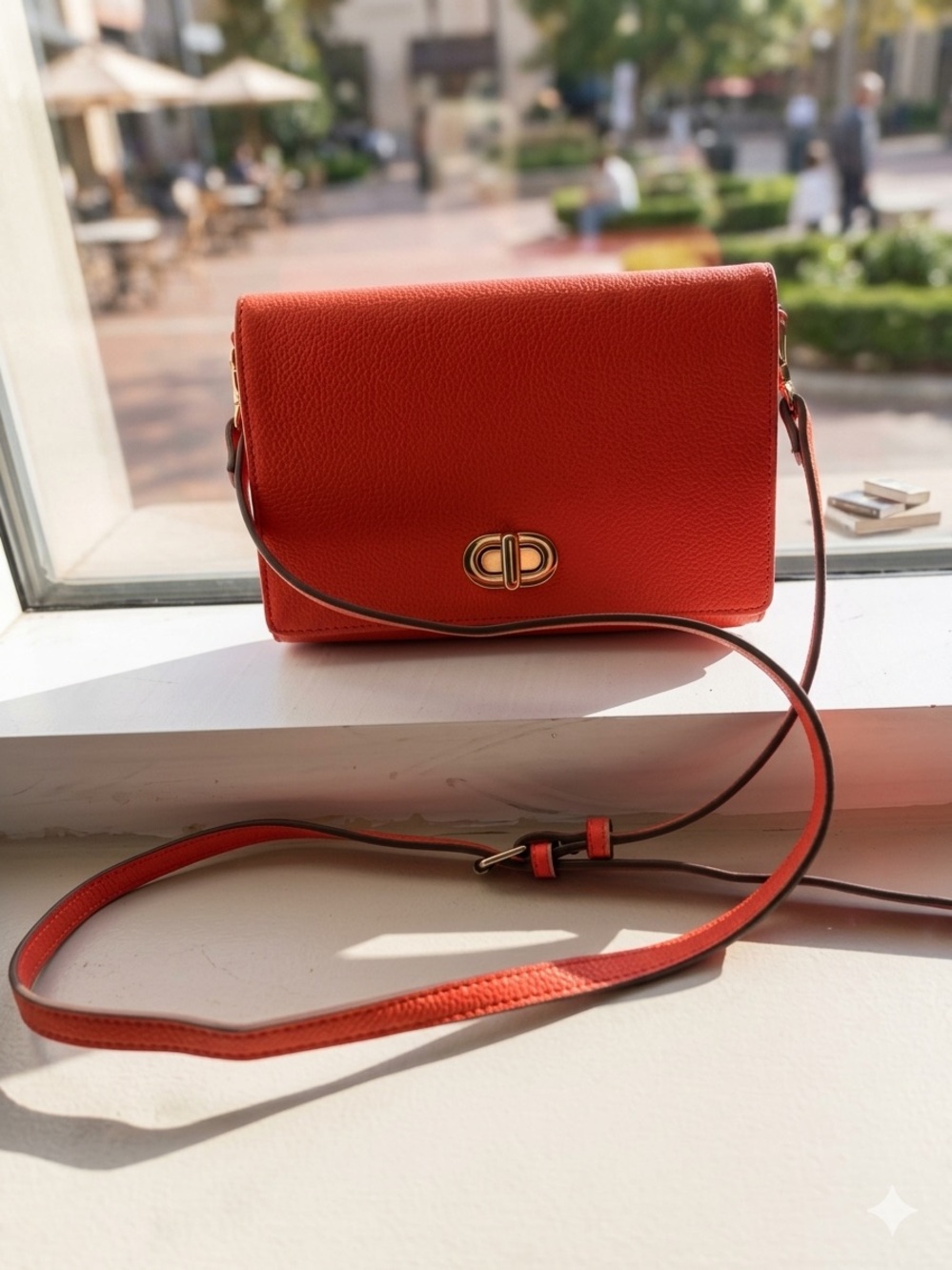 Nanette Lepore Sleek Orange Pebbled Leather Crossbody Bag with Gold Hardware